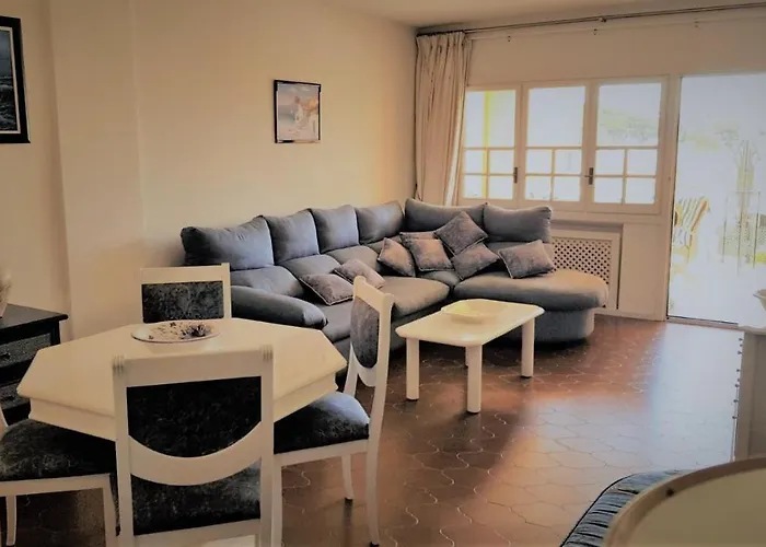 K105 Cabopino Апартаменти