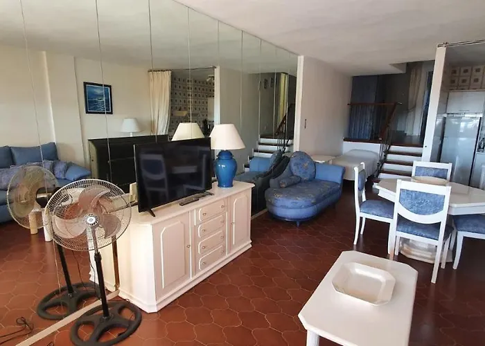 K105 Cabopino Апартаменти