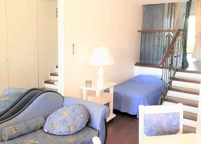 K105 Cabopino Апартаменти *