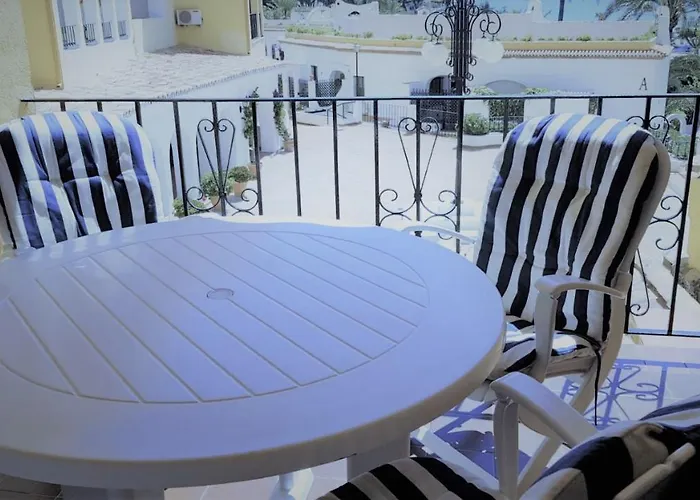 K105 Cabopino Апартаменти *